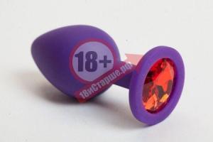 Фиолетовая силиконовая пробка с алым стразом - 8,2 см.